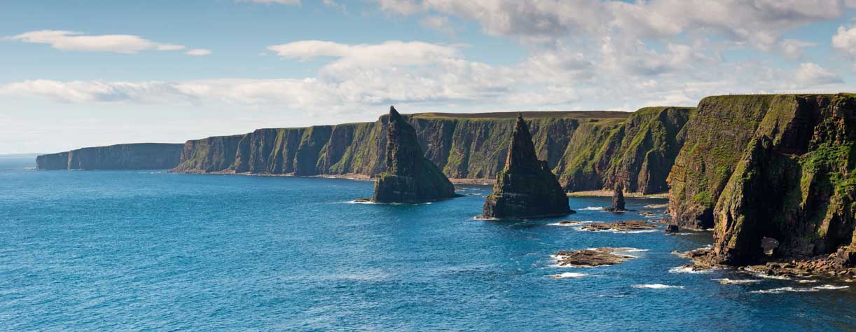 Cruising by Duncansby Sea Stacks